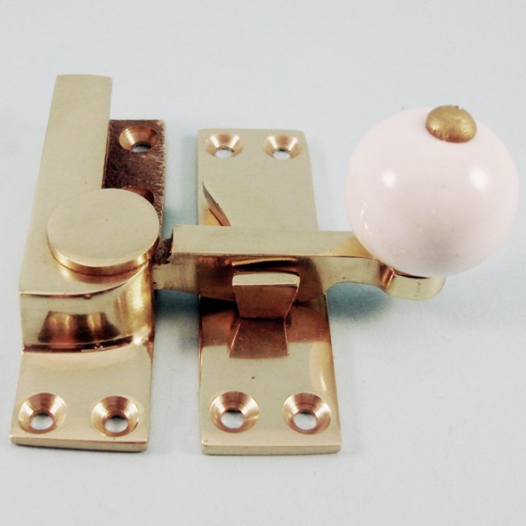 THD157/PB • Non-Locking • Polished Brass • Quadrant Ceramic Knob Sash Fastener